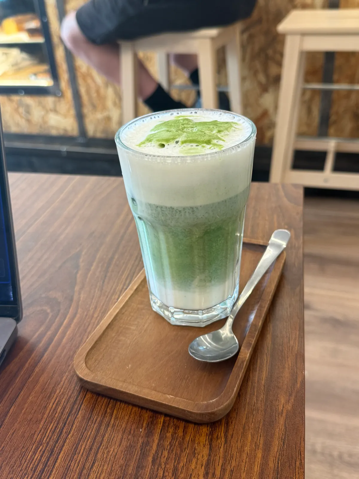 Freshly prepared matcha latte at Bruma Roasting